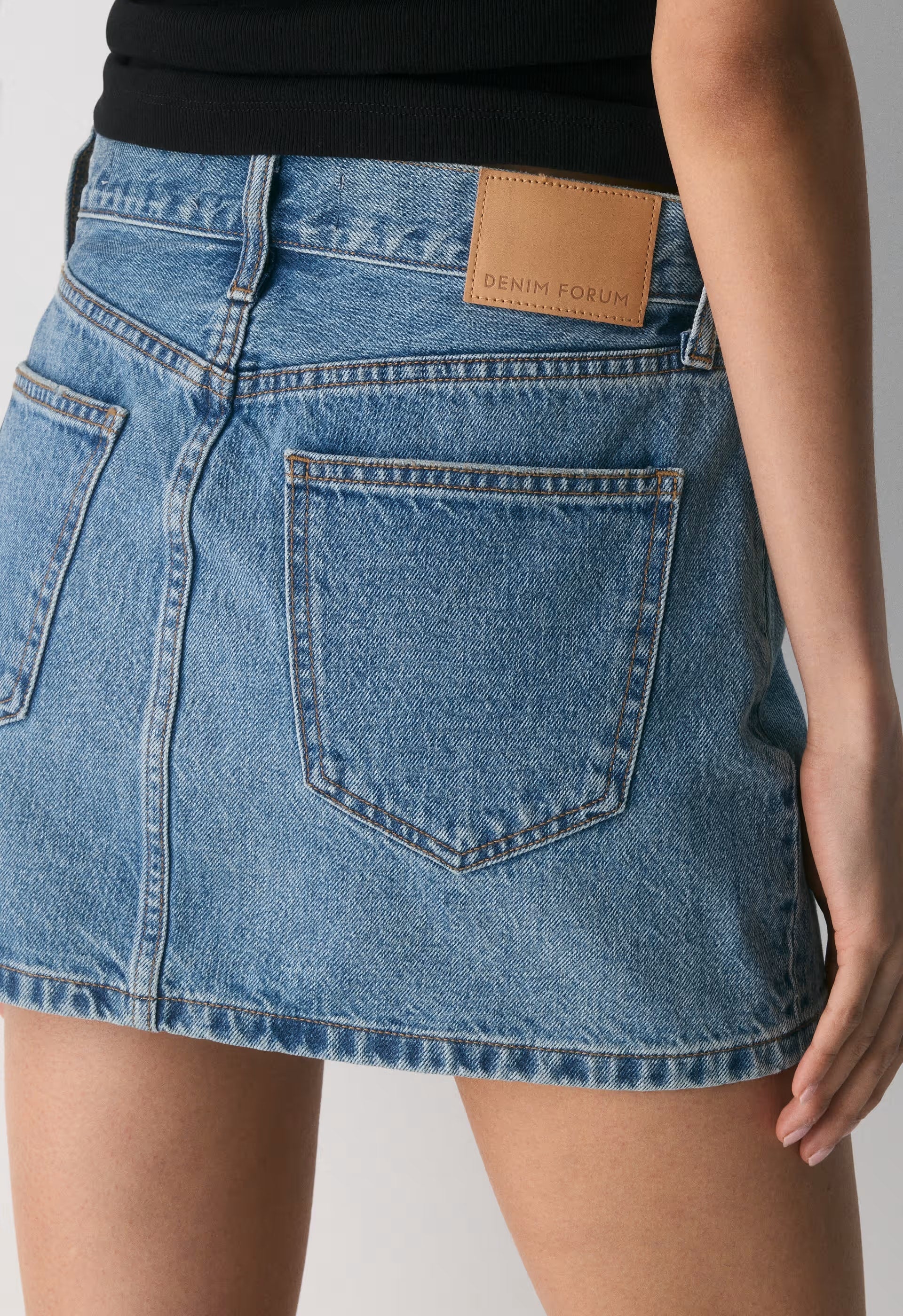 Denim Forum The ‘90s Ricci Micro Denim Skirt - 5 YRS KISS N TELL BLEU